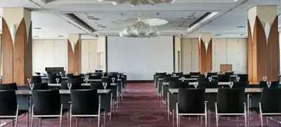 Foto von Tagung mit Domblick
