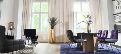 Foto von SATELLITE OFFICE KUD15 Gloria Berlin Kaminlounge „Gloria Berlin“