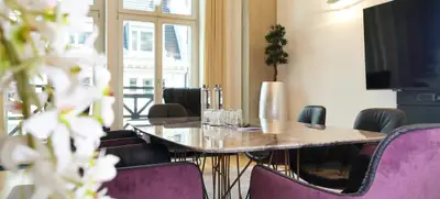 Foto von SATELLITE OFFICE Unter den Linden - Kaminlounge „Römischer Hof“
