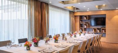 Foto von Weihnachtsfeier am gedeckten Tisch - Hotel Maier